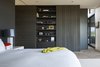 Modern home with Light Hardwood Floor. Master bedroom storage wall Photo 12 of High Desert Modern