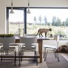 Modern home with Dining Room, Pendant Lighting, Table, Light Hardwood Floor, and Chair. Dining, cat Photo 8 of High Desert Modern