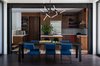 Modern home with Kitchen, Wood Cabinet, Refrigerator, Wall Oven, Engineered Quartz Counter, Glass Tile Backsplashe, Cooktops, Dishwasher, and Colorful Cabinet. Dining Room, Kitchen beyond Photo 4 of Tree House