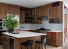 Modern home with Kitchen, Wood Cabinet, Range Hood, Engineered Quartz Counter, Refrigerator, Glass Tile Backsplashe, Medium Hardwood Floor, Colorful Cabinet, Cooktops, and Wall Oven. Kitchen, with cabinets by Kerf Photo 5 of Tree House