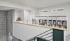 Modern home with Office, Lamps, Storage, Shelves, Study Room Type, Carpet Floor, Chair, Desk, and Bookcase. Office/Loft Photo 4 of Live/Work Space