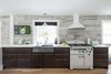 With enough lower cabinet storage, upper cabinets were eliminated, in order to keep the space as open as possible. Photo 16 of Burlington Residence modern home