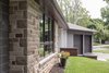 The existing stone was re-pointed and refurbished because as the architect said, "they just don't make it like this anymore". Photo 9 of Burlington Residence modern home