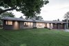 The renovation and addition have been seamlessly stitched together. Photo of Burlington Residence modern home