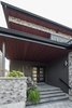 The roof projections provide cover and dynamic forms. Photo 9 of Turkey Point Beach House modern home
