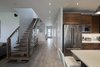 A view back to the entry door, from the dining room. Photo 12 of Turkey Point Beach House modern home