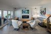 The living room has a 16' retractable glass wall Photo 17 of Turkey Point Beach House modern home