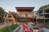 The lower deck has motorized insect screens which enclose and protect the deck. Photo 5 of Turkey Point Beach House modern home