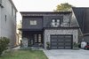 Road Side: The Roadside Façade is understated and diminutive. Photo 6 of Turkey Point Beach House modern home