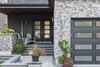 The front entry is recessed and covered. Photo 8 of Turkey Point Beach House modern home