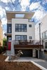 Modern home with Outdoor and Front Yard. Front yard, Entry & Front deck Photo 2 of Tall Haus