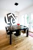 Dining room with sliding doors to backyard Photo 12 of Tall Haus modern home