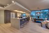 Wide-Open Kitchen with Views of LAX's Queue of Landing Planes Fading to Zero on the Horizon Photo of The Vogel Residence modern home