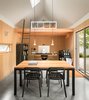 Modern home with Office, Library Room Type, Chair, Study Room Type, Storage, Shelves, Concrete Floor, Lamps, Bookcase, and Desk. Studio + Workshop Space Photo 4 of The Long Studio