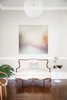 With a nod to the home's backstory, furnishings from 100 years of design history look effortless in the entry. Turn-of-the-century partners include a 2002 Mooi Random light above a late 19th century sofa; a Cherner chair mimics the curves. Photo 9 of SOMO: southern mod modern home