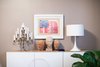 A Breuer style floating credenza in the dining room is topped with a vintage candelabra and Flos Spun light. Photo 12 of SOMO: southern mod modern home