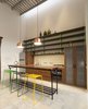 Modern home with Kitchen, Wood Cabinet, Engineered Quartz Counter, Wood Counter, Ceramic Tile Backsplashe, Pendant Lighting, Refrigerator, Cooktops, and Undermount Sink. Tropical wood Tzalam add warm to the space.
Photo 9 of Lemon Tree House
