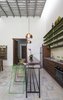 Modern home with Kitchen, Ceramic Tile Backsplashe, Wood Cabinet, Cement Tile Floor, Engineered Quartz Counter, Pendant Lighting, Accent Lighting, Refrigerator, Cooktops, and Undermount Sink. Furniture and decoration add the characteristic colorfull palete of mexican traditions Photo 8 of Lemon Tree House