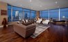 Modern home with Living Room, Bench, Chair, Coffee Tables, Media Cabinet, Console Tables, Table, Lamps, Ceiling Lighting, Recessed Lighting, and Accent Lighting. Living Room Photo 9 of Ritz-Carlton Residences, 48G