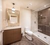 Modern home with Bath Room, Marble Counter, Marble Floor, Drop In Sink, Full Shower, Ceiling Lighting, Recessed Lighting, Open Shower, Pendant Lighting, Marble Wall, and One Piece Toilet. Bathroom two Photo 17 of Ritz-Carlton Residences, 48G