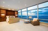 Modern home with Bedroom, Bed, Night Stands, Bench, Storage, Bookcase, Chair, Carpet Floor, Lamps, Ceiling Lighting, Recessed Lighting, and Accent Lighting. Master Bedroom Photo 15 of Ritz-Carlton Residences, 48G