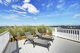 The third-floor rooftop terrace provides beautiful unobstructed views of nature and the surroundings. 