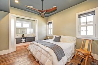 The cozy bedroom features built-in, noise-cancelling acoustics for a peaceful rest. 