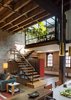 A custom steel stair repurposes timbers from the old roof joists as treads and landings. Photo 7 of Tribeca Loft modern home