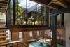 The court exposes the sky, fills the previously dark loft with natural daylight, and brings accessible outdoor space into the primary living zones. Photo 2 of Tribeca Loft modern home