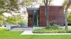 Modern home with Exterior, Flat RoofLine, Cabin Building Type, Wood Siding Material, and House Building Type. photography by Leonid Furmansky Architectural Photography Photo 3 of Lake Austin Cabin