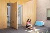 Modern home with Outdoor and Front Yard. A large pivot door gives the entry a dramatic feel. Photo 3 of Slatted Beach Retreat