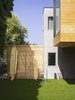 Modern home with Outdoor. An outdoor shower makes it easy to hose off after a trip to the beach. Photo 13 of Slatted Beach Retreat