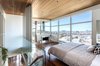 The bedroom with sliding walls and cedar ceiling. Photo 6 of Schindler Residence modern home