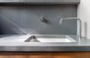 Modern home with Bath Room, Undermount Sink, Concrete Wall, and Concrete Counter. Detail of existing sink Photo 7 of Schindler Residence