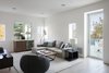 Modern home with Living Room, Sofa, Ottomans, End Tables, Light Hardwood Floor, Recessed Lighting, Lamps, Accent Lighting, Chair, Bar, Coffee Tables, Ceiling Lighting, and Shelves. Media Room Photo 18 of Minimal House One