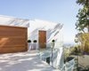 Modern home with Exterior, Flat RoofLine, House, and Wood Siding Material. Front Door Approach Photo 2 of Minimal House One