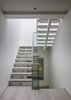 Modern home with Staircase, Glass Railing, Wood Railing, and Wood Tread. Stairway and Skylight above Photo 15 of Minimal House One