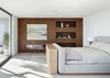 Modern home with Bedroom, Bed, Accent Lighting, Bookcase, Recessed Lighting, Night Stands, Shelves, Ceiling Lighting, and Light Hardwood Floor. Master Bedroom Photo 10 of Minimal House One