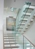 Modern home with Staircase, Wood Railing, Glass Railing, and Wood Tread. Open Stringer Staircase Photo 16 of Minimal House One