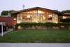 The house was built in 1954. However, this front is an extension that was done in 1962 to expand the dining space and the kitchen. Photo of Kallin Rancho modern home