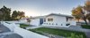 Modern home with Exterior, Mid-Century Building Type, and House Building Type. Magical sunset hour in the desert. Photo 8 of This Palm Springs Gem Gets A Modern Makeover With A Bohemian Twist
