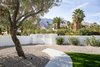 To save water, much of the yard has been filled in with desert pebbles. Photo 14 of This Palm Springs Gem Gets A Modern Makeover With A Bohemian Twist modern home
