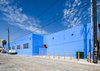 Modern home with Exterior, Stucco Siding Material, and Curved RoofLine. Rear building alley exterior Photo 3 of HATCHlabs @LA Bioscience HUB