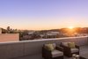 A large roof deck is located at the northwest portion of the third floor, with expansive views of downtown Pittsburgh. Photo 6 of Ligonier Street Residence modern home