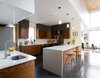 This living/dining room space is the center of family life as it is contiguous with the open kitchen and second floor bedrooms. Photo 5 of Lola House modern home