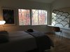 Modern home with Bedroom, Bed, Light Hardwood Floor, Chair, and Lamps. Daughter's bedroom - newly renovated Photo 5 of Mid-Century Life Crisis