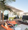 Modern home with Outdoor, Back Yard, Trees, Raised Planters, Wood Patio, Porch, Deck, Vertical Fences, Wall, and Wood Fences, Wall. corten steel planter + Bonsai garden Photo 2 of The Beach Lab