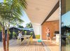 Rear wood Deck material from Thermory , 20' wide multi slide glass doors by Western Window Systems Photo 3 of The Beach Lab modern home