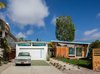Modern home with Outdoor, Pavers Patio, Porch, Deck, Front Yard, Grass, Small Patio, Porch, Deck, Decking Patio, Porch, Deck, Horizontal Fences, Wall, Trees, Walkways, Concrete Patio, Porch, Deck, and Raised Planters. Old MCM lines meets the new angled pavilion Photo 2 of Cardiff with A Side of Ranch