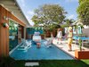Modern home with Outdoor, Large Patio, Porch, Deck, Trees, Hardscapes, Pavers Patio, Porch, Deck, Grass, Wood Fences, Wall, Walkways, Back Yard, Concrete Patio, Porch, Deck, Tile Patio, Porch, Deck, Horizontal Fences, Wall, Raised Planters, and Wood Patio, Porch, Deck. Fun back yard hang out. Amazing outdoor furniture by www.lolldesigns.com Photo 12 of Cardiff with A Side of Ranch